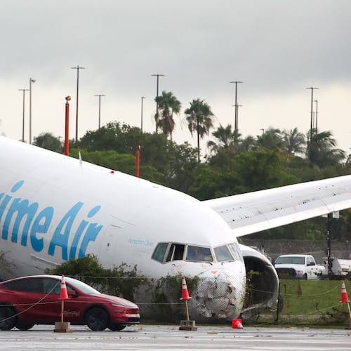 An Amazon cargo plane sits at Miami International Airport after overshooting a runway on Monday, Sept. 7, 2026, in Miami. (AP Photo/David Santiago)
