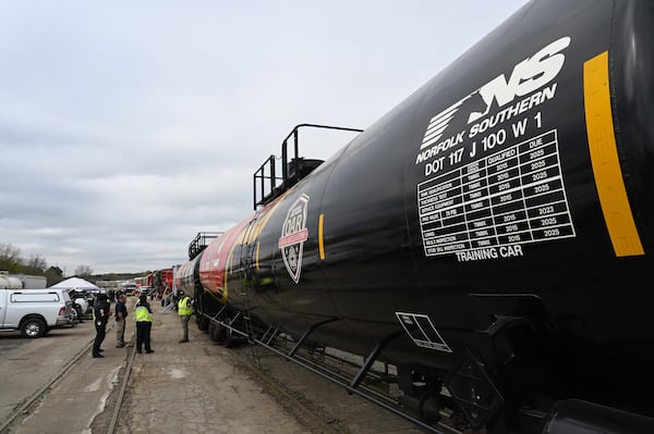 An instructor leads a group of Atlanta-area first responders at the training site as Norfolk Southern’s "Safety Train" makes a stop in East Point, Wednesday, March 24, 2026.  (Hyosub Shin/AJC)