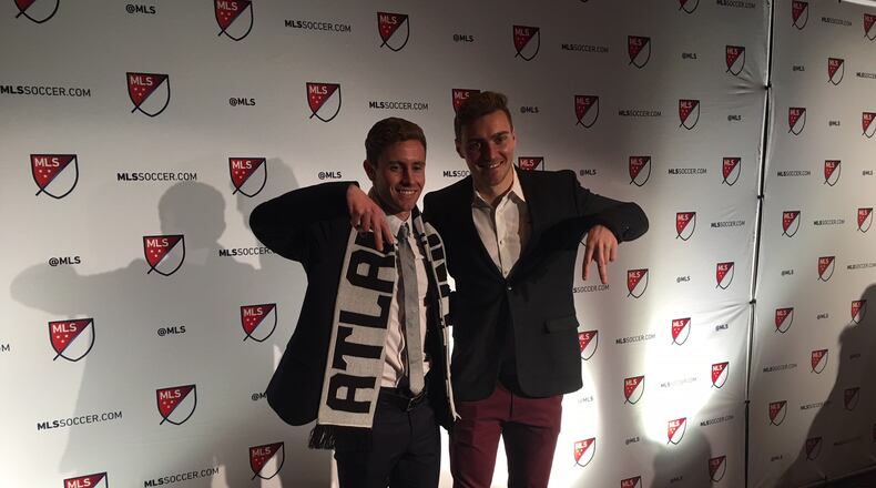 Atlanta United's Jon Gallagher, selected with the 14th pick in Friday's MLS SuperDraft, and Julian Gressel, the reigning MLS Rookie of the Year, pose in Philadelphia.