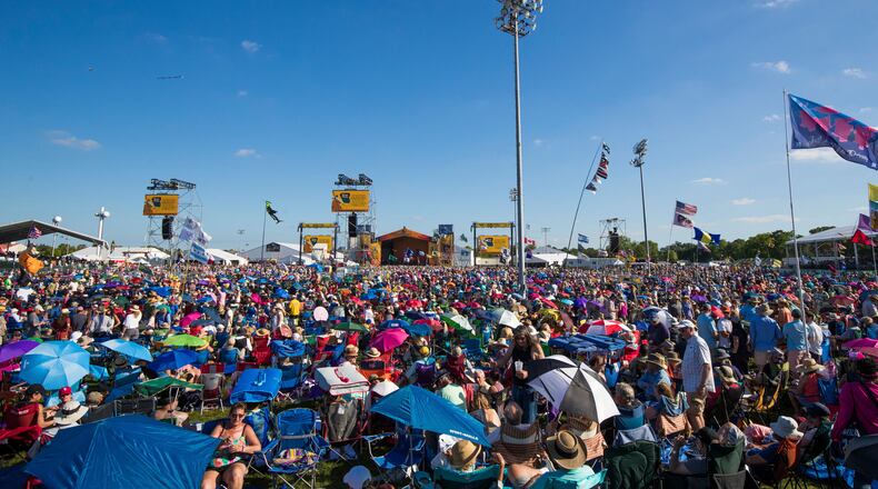 Crowds wait for Van Morrison to perform on the Acura Stage during the New Orleans Jazz & Heritage Festival in New Orleans, Sunday, April 28, 2019. (AP Photo/Sophia Germer)