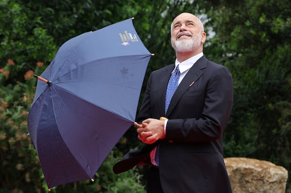Albanian Prime Minister Edi Rama waits to welcome the leaders of 47 European countries and organizations, ahead of a summit where will discuss security, defense and democratic standards against the backdrop of Russia's war on Ukraine, in Tirana, Albania, Friday, May 16, 2025. (AP Photo/Vlasov Sulaj)