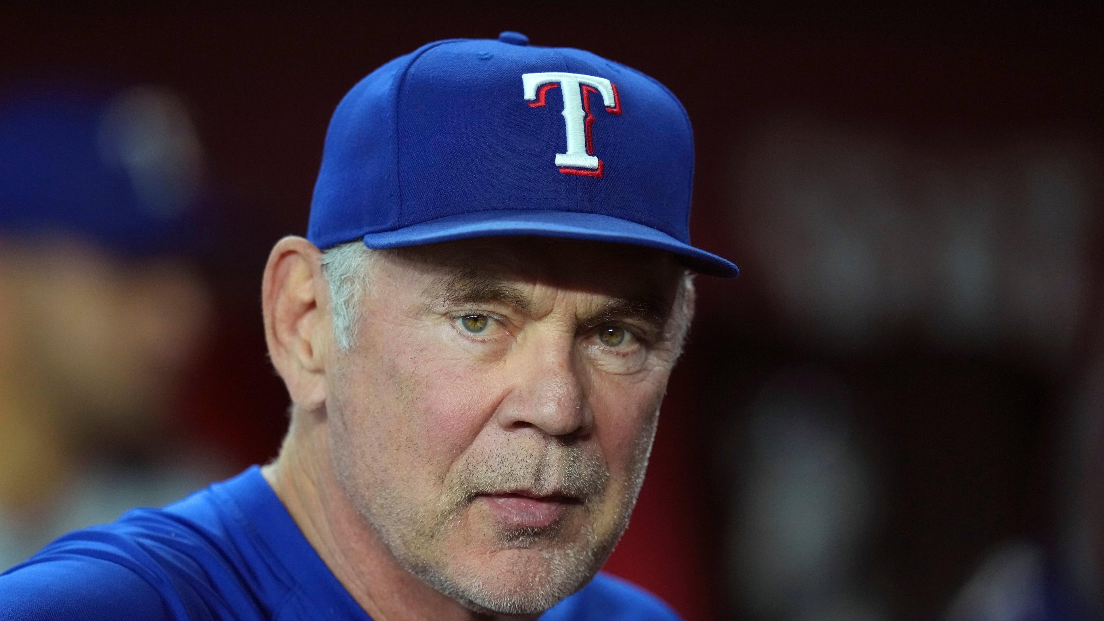 Texas Rangers manager Bruce Bochy pauses in the team dugout prior to a baseball game against the Arizona Diamondbacks Wednesday, Sept. 3, 2025, in Phoenix. (AP Photo/Ross D. Franklin)