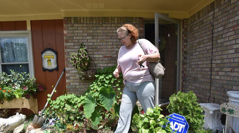 Jammie Duvall leaves her home in Columbus earlier this month. Duvall, a former cafeteria worker at West Central Georgia Hospital, said that after she reported that a warehouse worker was repeatedly making sexually explicit comments to her, a supervisor shrugged off the complaint. HYOSUB SHIN / HSHIN@AJC.COM
