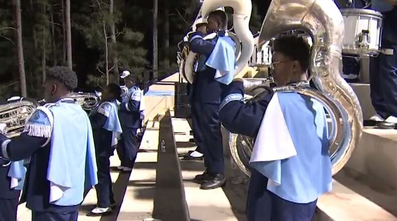 Jahkee Johnson, a 15-year-old Cedargrove High student, manages to play in the marching band despite being a double amputee. (Credit: Channel 2 Action News)