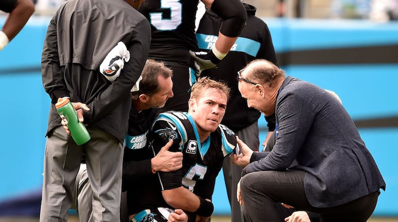 Taylor Heinicke, formerly of the Panthers, injures his elbow against the Falcons during a game in 2018. The NFL, along with the NFL Physicians Society and the Professional Football Athletic Trainer Society, will start a program with four Historically Black Colleges and Universities medical schools, including the Morehouse School of Medicine, to increase diversity in the sports medicine field and within the league’s 32 teams. (Photo by Grant Halverson)
