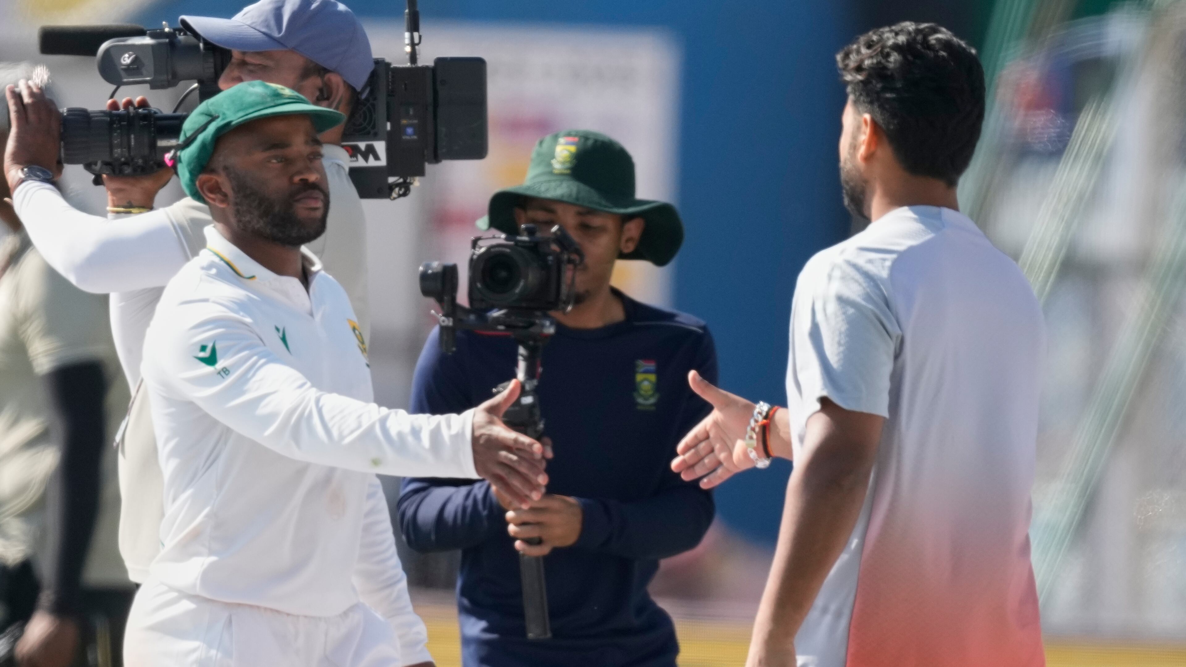 India's captain Rishab Pant, right, and South Africa's captain Temba Bavuma shake hands after South Africa wins the test series against India in Guwahati, India, Saturday, Nov. 22, 2025. (AP Photo/Anupam Nath)