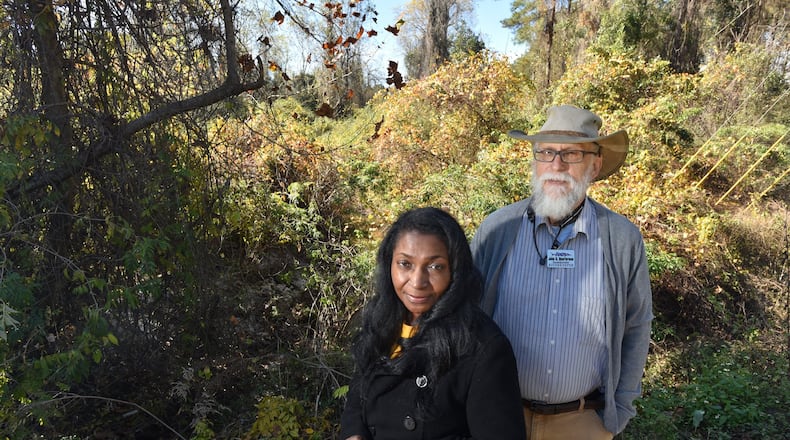 Suwannee Riverkeeper John Quarterman and Lowndes County resident Debra Tann at Beatty Branch near Moody Air Force Base, which was contaminated by a special firefighting foam used by the military. Tann’s well is less than a mile from the base, and she and Quarterman expressed concern about the pollution of groundwater by the Air Force. HYOSUB SHIN / HSHIN@AJC.COM