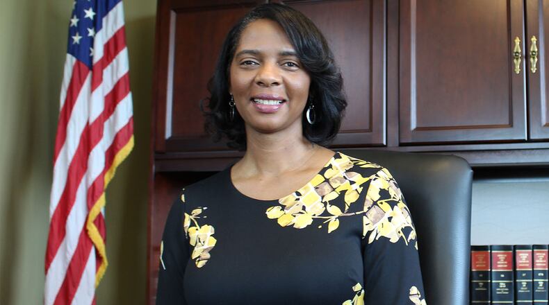 Cobb County District Attorney Joyette Holmes announces a partnership with Kennesaw State University to offer counseling services for victims of property crimes.