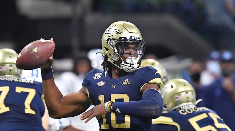 Georgia Tech' quarterback Jeff Sims (10) gets off a pass at Mercedes-Benz Stadium on Saturday, September 25, 2021. Georgia Tech won 45-22 over North Carolina. (Hyosub Shin / Hyosub.Shin@ajc.com)