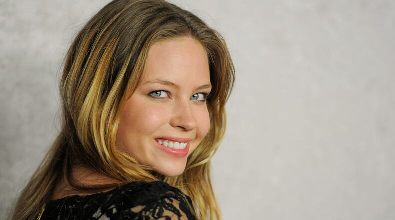 FILE - Actor Daveigh Chase poses at the Season 5 premiere of HBO series "Big Love," in Los Angeles on Jan. 12, 2011. (AP Photo/Chris Pizzello, File)