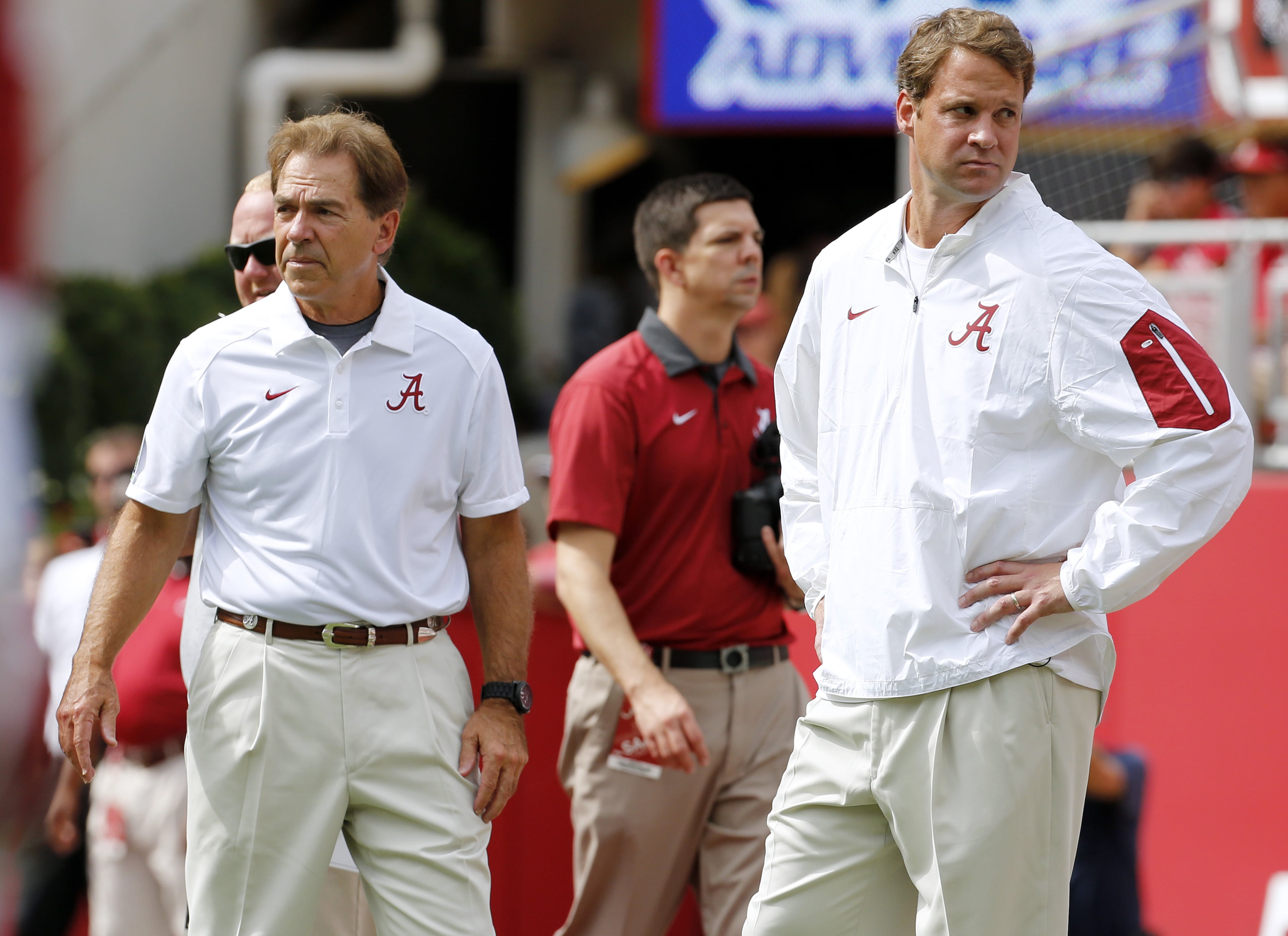 Alabama head coach Nick Saban, left, and offensive coordinator Lane Kiffin stand next to each other before an NCAA college football game against Louisiana Monroe in Tuscaloosa, Ala., Saturday, Sept. 26, 2015. (Jonathan Bachman/AP)