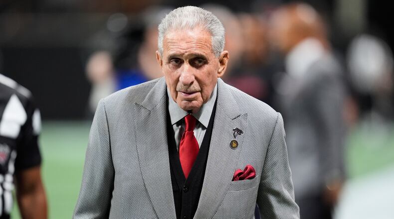 Atlanta Falcons owner Arthur Blank walks on the field before an NFL football game against the Miami Dolphins, Sunday, Oct. 26, 2025, in Atlanta. (AP Photo/Mike Stewart)