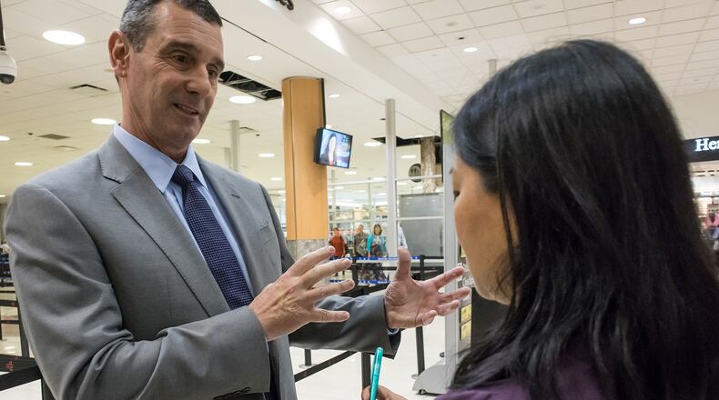 TSA administrator David Pekoske talks with a reporter in front of the main security checkpoint at Hartsfield-Jackson International Airport, Thursday. STEVE SCHAEFER / SPECIAL TO THE AJC