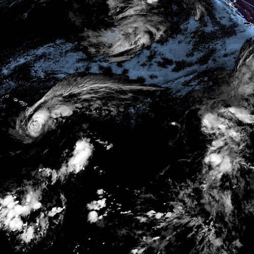 This satellite image released by NOAA shows Tropical Storm Lala over the Pacific Ocean, near Hawaii, Saturday, Aug. 15, 2026. (NOAA via AP)