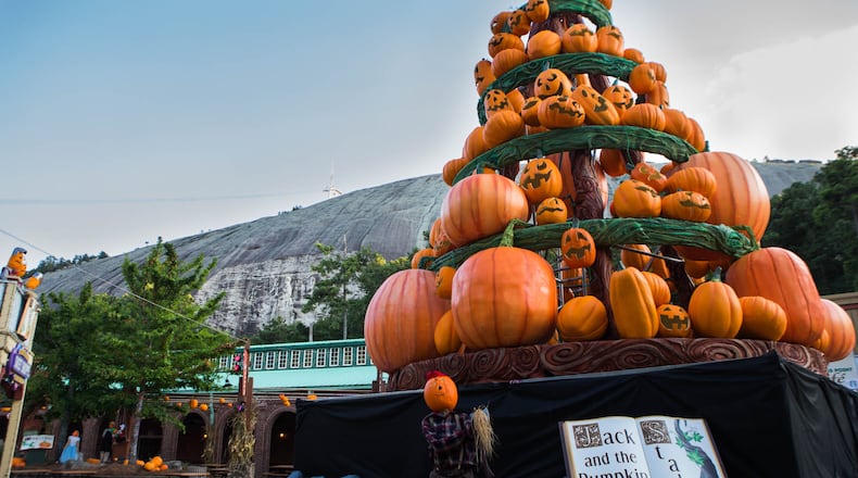 This pumpkin tower turns into a glow-in-the-dark attraction at night.