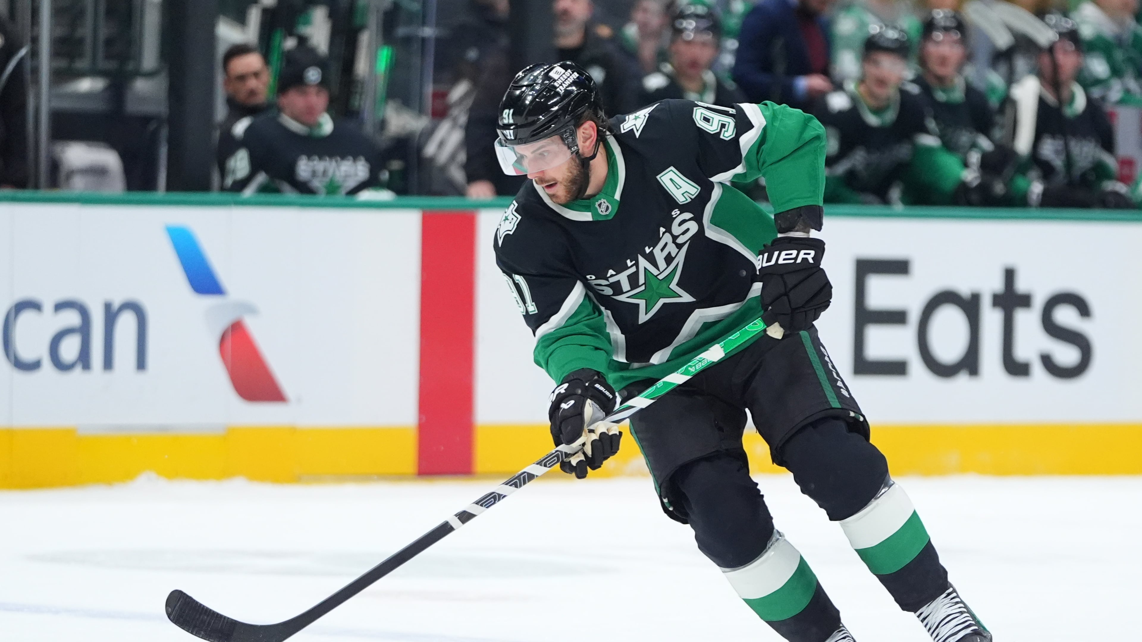 Dallas Stars center Tyler Seguin skates with the puck during the first period of an NHL hockey game against the Ottawa Senators, Sunday, Nov. 30, 2025, in Dallas. (AP Photo/LM Otero)
