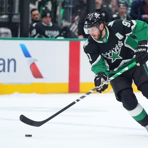 Dallas Stars center Tyler Seguin skates with the puck during the first period of an NHL hockey game against the Ottawa Senators, Sunday, Nov. 30, 2025, in Dallas. (AP Photo/LM Otero)