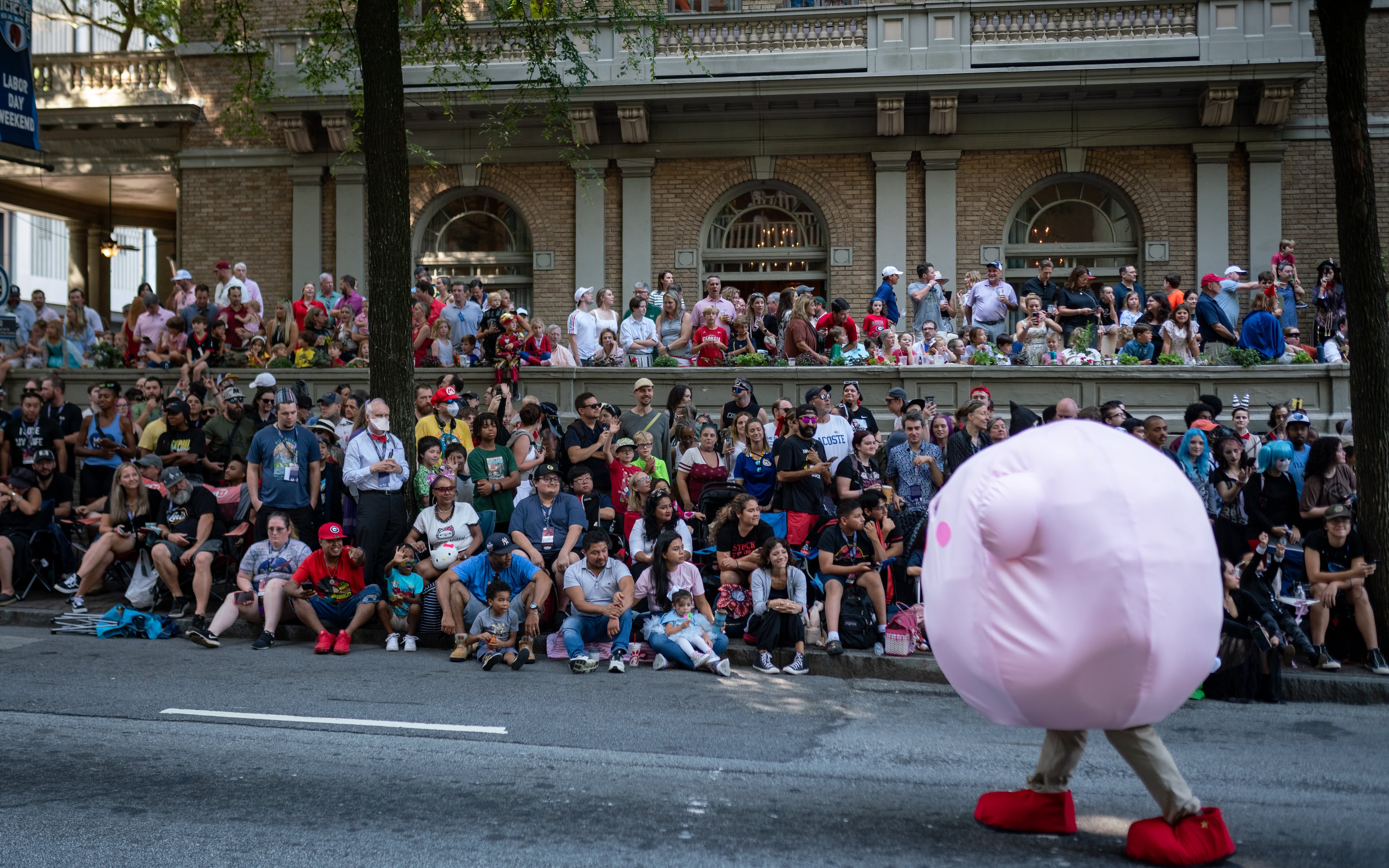 Thousands lined up along Peachtree Street on Saturday morning, August 31, 2024, for the annual Dragon Con parade in Atlanta. (Ben Hendren for The Atlanta Journal-Constitution)
