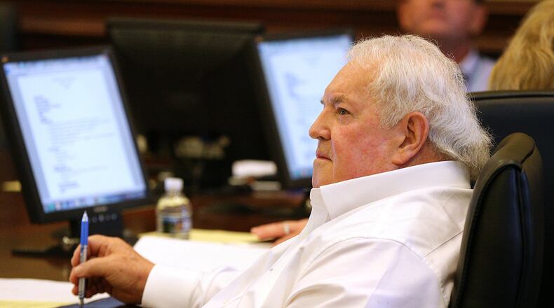 Phillip Beard chairs both Buford’s City Commission and school board. He’s held a commission seat for more than 40 years. Curtis Compton/ccompton@ajc.com