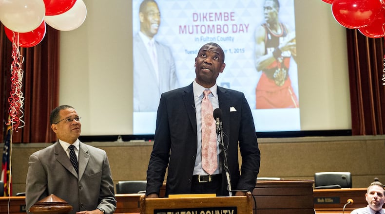 Dikembe Mutombo (center) speaks during the celebration naming September 1 as Dikembe Mutombo Day in Fulton County at the Fulton County Government Center in Atlanta on Tuesday, September 1, 2015. JONATHAN PHILLIPS / SPECIAL
