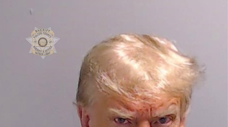 In a handout provided by the Fulton County Sheriff's Office, former President Donald Trump poses for his booking photo at the Fulton County Jail on Aug. 24, 2023, in Atlanta. (Fulton County Sheriff's Office via Getty Images/TNS)