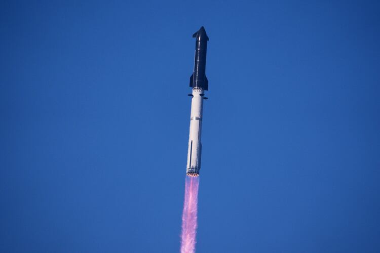 SpaceX's mega rocket Starship makes a test flight from Starbase, Texas, Friday, July 24, 2026. (AP Photo/Eric Gay)