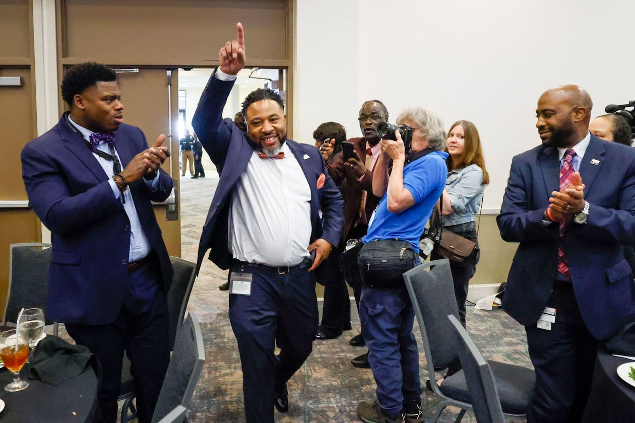 DeKalb County Superintendent Devon Horton enters the hall moments before the State of the District address March 14, 2024. (Miguel Martinez/AJC)