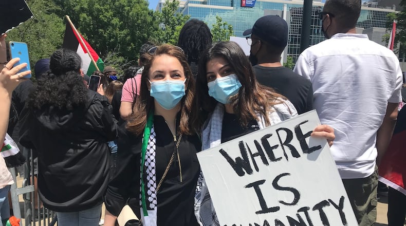Dr. Dania Masseoud (left) and her daughter Noor Kabakibou have family in Gaza. "They're all sleeping in the same room so that if one dies they all die," said Kabakibou. Photo: Bo Emerson