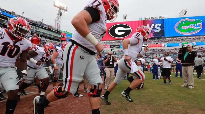 Georgia quarterback Jake Fromm leads the team on TIAA Bank Field for pregame to play Florida in a NCAA college football game on Saturday, November 2, 2019, in Jacksonville. Curtis Compton/ccompton@ajc.com