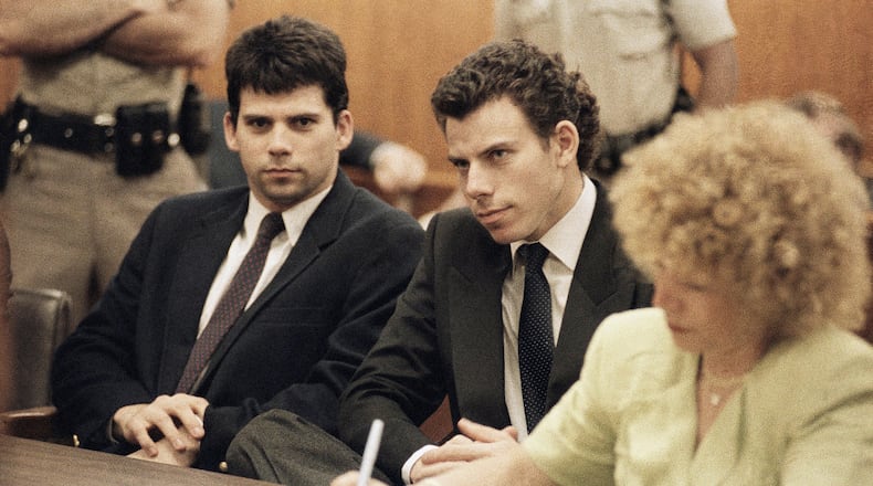FILE - Lyle, left, and Erik Galen Menendez sit in a courtroom in Beverly Hills, Calif., May 14, 1990. (AP Photo/Kevork Djansezian, File)
