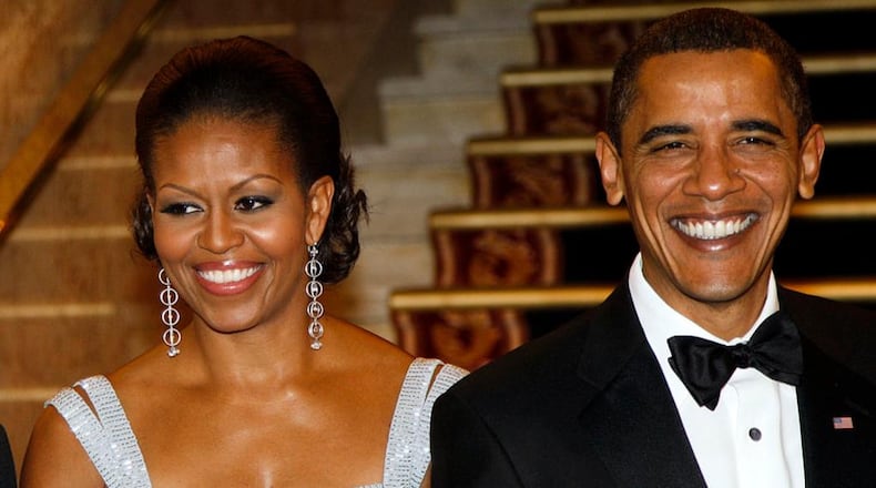 U.S. President and Nobel Peace Prize laureate Barack Obama and First Lady Michelle Obama arrive for the Nobel Banquet in Oslo on December 10, 2009.