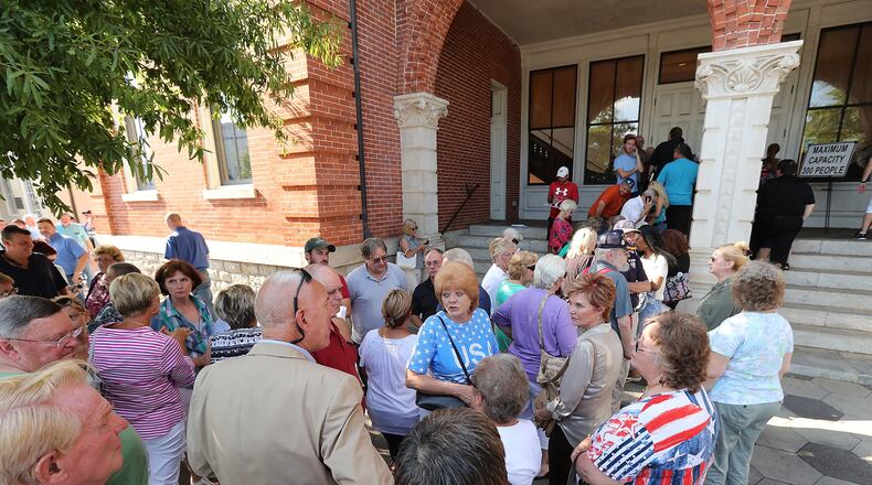 Hundreds of concerned citizens wait in line to get inside as Newton County holds two town hall meetings to discuss plans to build a mosque and cemetery in the county on Monday, August 22, 2016, in Covington. Curtis Compton /ccompton@ajc.com