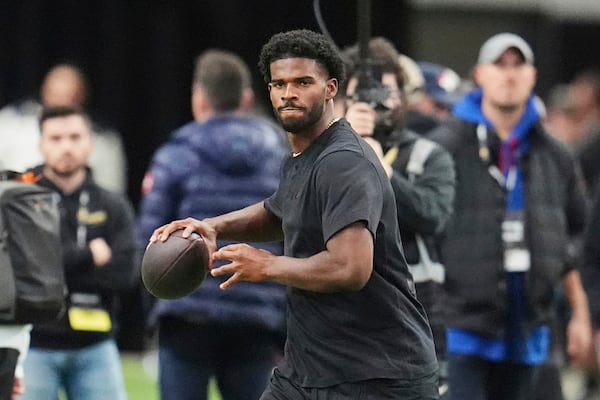 FILE - Colorado quarterback Shedeur Sanders takes part in passing drills during Colorado's NFL football pro day Friday, April 4, 2025, in Boulder, Colo. (AP Photo/David Zalubowski, File)