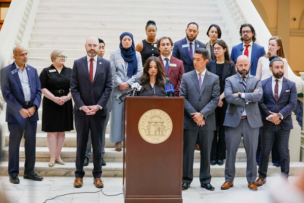 Spanish-language journalist Mario Guevara's daughter Katherine Guevara speaks during a press conference at the Georgia State Capitol in Atlanta, on Tuesday, July 22, 2025. (Miguel Martinez/Atlanta Journal-Constitution via AP)