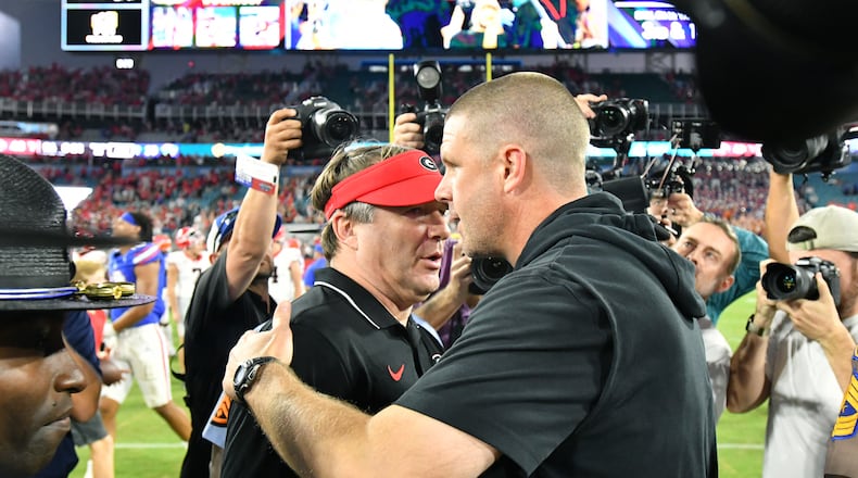 Georgia head coach Kirby Smart and Florida head coach Billy Napier shake hands after Georgia beat Florida during an NCAA football game at EverBank Stadium, Saturday, October 28, 2023, in Jacksonville, FL. Georgia won 43-20 over Florida.  (Hyosub Shin / Hyosub.Shin@ajc.com)