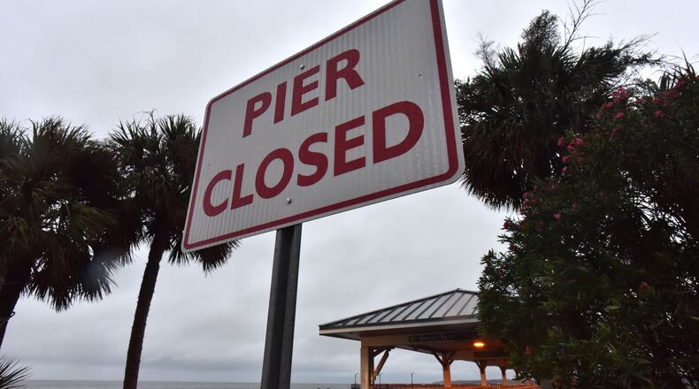 St. Simons Island Pier is closed as Hurricane Matthew moves closer to Georgia on Friday morning, October 7, 2016. HYOSUB SHIN / HSHIN@AJC.COM