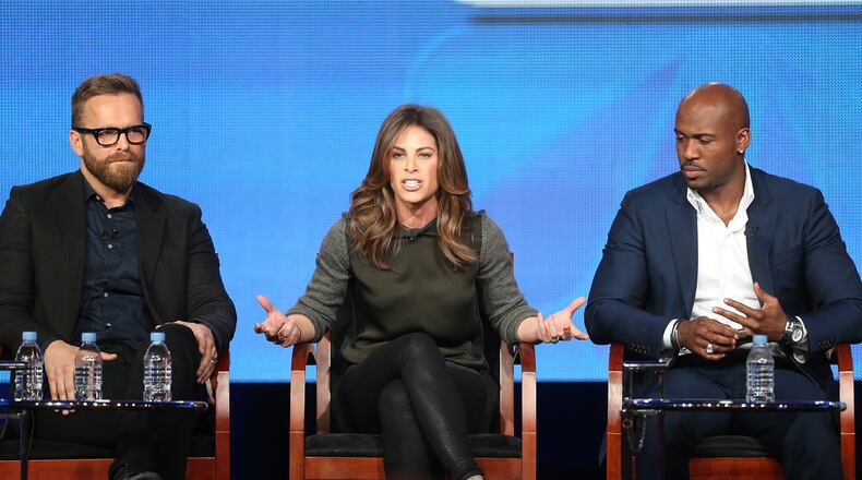 Trainer Bob Harper, former trainer Jillian Michaels, and trainer Dolvett Quince speak at the 'The Biggest Loser' panel discussion in 2013. (Photo by Frederick M. Brown/Getty Images)