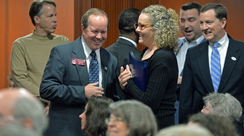 State Rep. Buzz Brockway chats with constituents. AJC file.