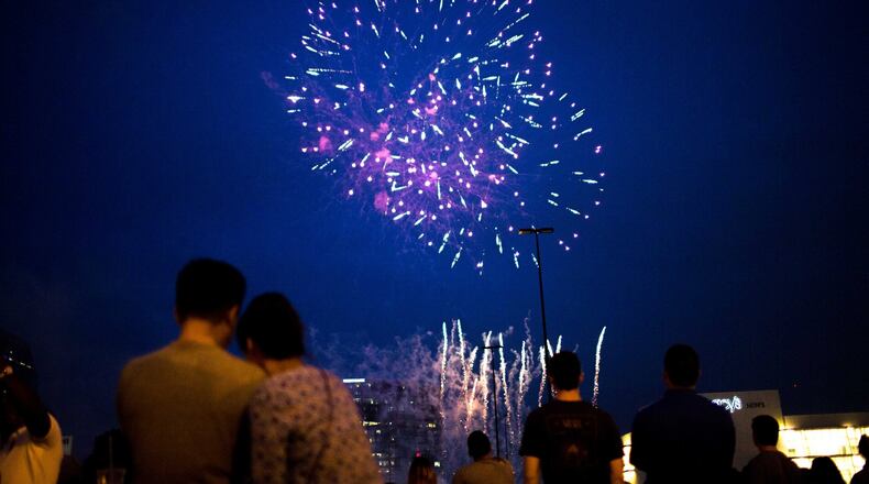 Fireworks illuminate the skies over Lenox Square during the annual July 4th event in 2015. BRANDEN CAMP/SPECIAL