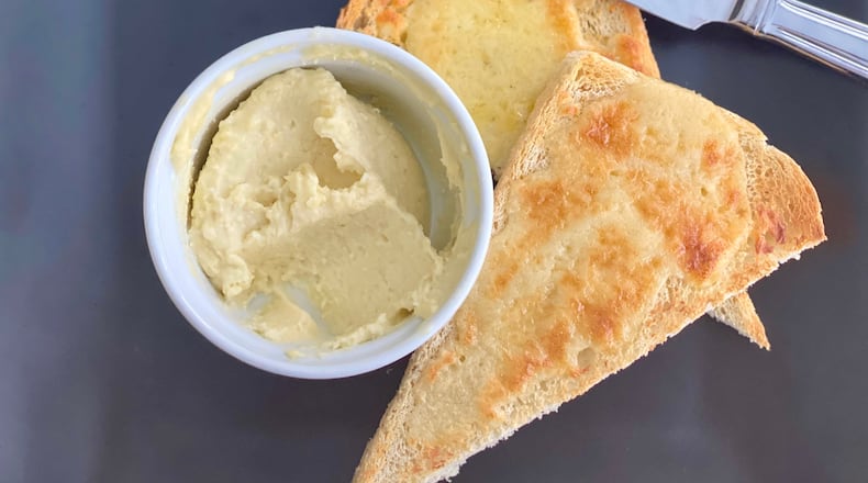 Simply delicious: fromage fort over sourdough, melted under the broiler.
Kellie Hynes for The Atlanta Journal-Constitution