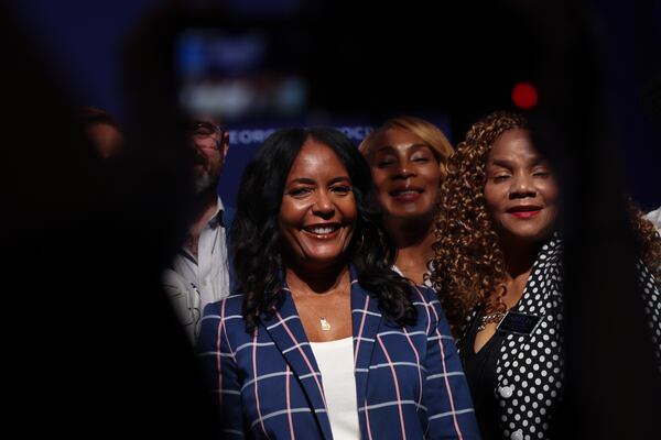Democratic gubernatorial candidate Keisha Lance Bottoms poses for photos with other statewide candidates at the Savannah Convention Center in Savannah on Saturday, Aug. 1, 2026. (Arvin Temkar/AJC)