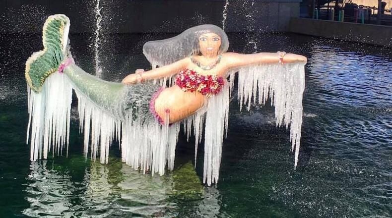 Icicles hang from a mermaid at the Nauticus museum in Norfolk, Virginia.