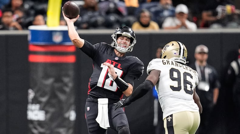 Atlanta Falcons quarterback Kirk Cousins (passes under pressure from New Orleans Saints defensive end Carl Granderson in the first half of an NFL football game, Sunday, Jan. 4, 2026, in Atlanta. (Mike Stewart/AP)