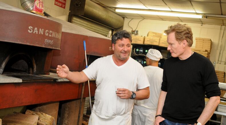 Giovanni Di Palma at Antico Pizza with Conan O'Brien. DiPalma's attorney says the restaurateur has never threatened any employee with deportation or termination.