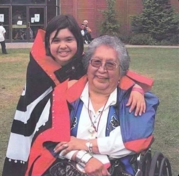 In this undated photo, Roberta “Birdie” Sam, member of Tlingit & Haida, poses with her grandmother Bessie Kitka in Juneau, Alaska. (Doe Stahr/Roberta Sam via AP)