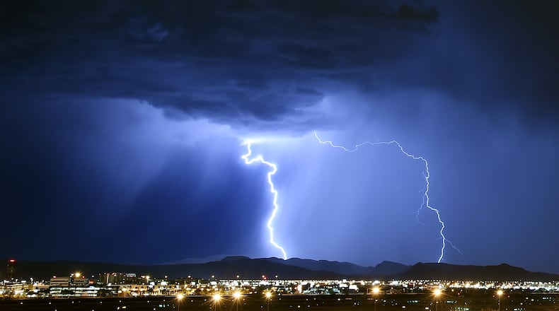 LAS VEGAS, NV - JULY 06: Lightning strikes during a thunderstorm on July 6, 2015 in Las Vegas, Nevada. (Photo by Ethan Miller/Getty Images)