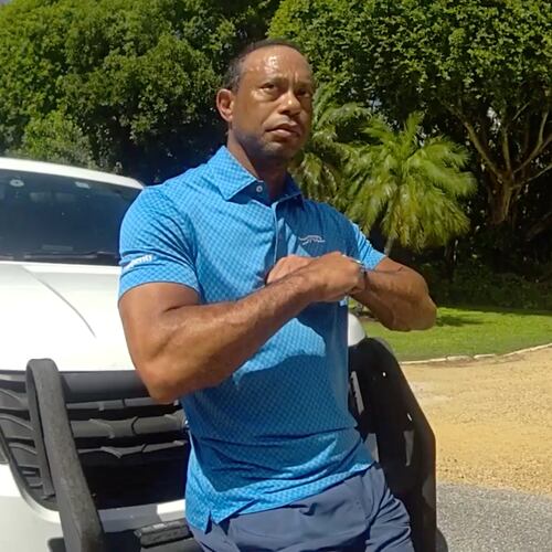 FILE - In this image from police body camera video released by the Martin County, Fla., Sheriff's Office, golfer Tiger Woods performs a field sobriety test for sheriff's deputies following a car crash in Jupiter Island, Fla., March 27, 2026. (Martin County Sheriff's Office via AP, File)