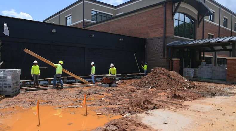 There is massive construction going on at Lilburn Middle School while it gets an extensive exterior face lift. JOHN AMIS