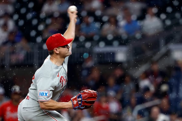 Philadelphia Phillies pitcher Tanner Banks throws during the first inning of a baseball game against the Atlanta Braves, Friday, June 27, 2025, in Atlanta. (AP Photo/Butch Dill)