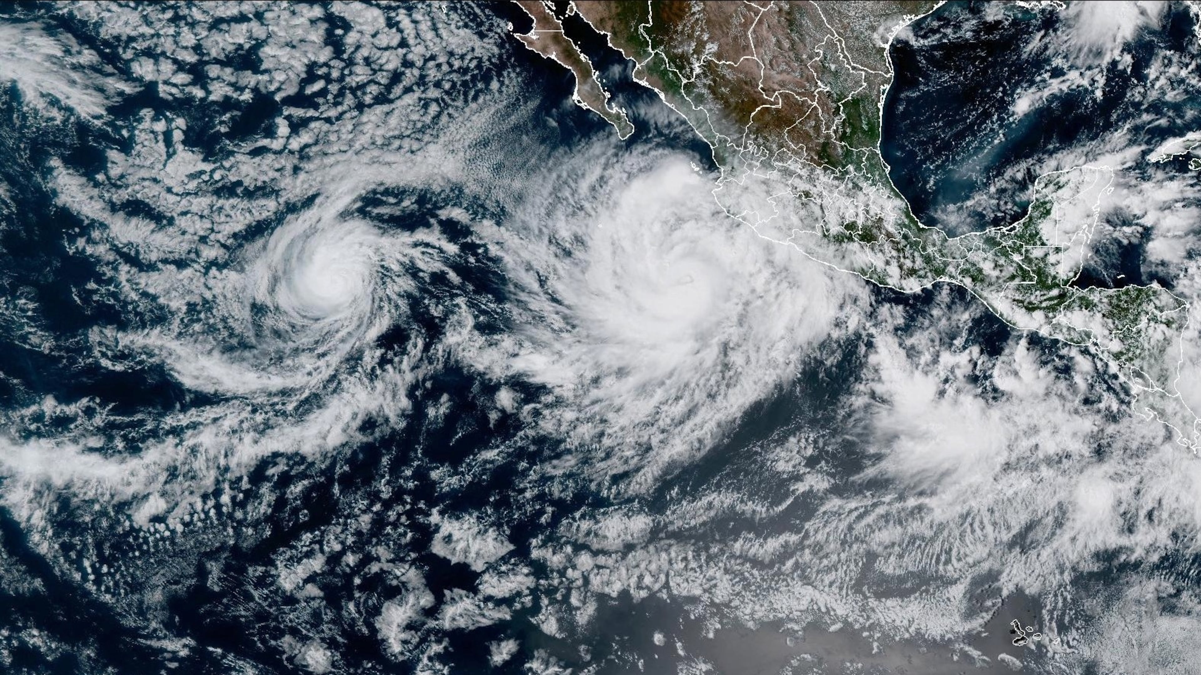 In this satellite image released by NOAA, Tropical Storm Priscilla forms in the easter Pacific off Mexico, Oct. 5, 2025. (NOAA via AP)